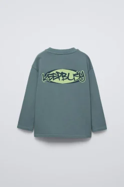Niños ZARA 6 - 14 Años·Camisetas<CAMISETA ACID WASH ESTAMPADO