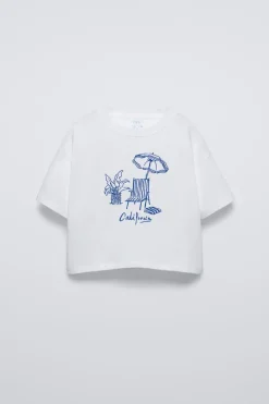 Niños ZARA 6 - 14 Años·Camisetas<CAMISETA BORDADO SILLA Y SOMBRILLA