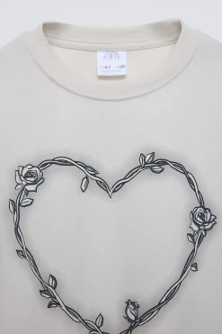 Niños ZARA 6 - 14 Años·Camisetas<CAMISETA CORAZÓN Y FLORES