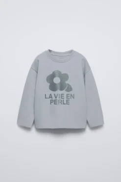 Niños ZARA 1½ - 6 Años·Camisetas|6 - 18 Meses·Camisetas<CAMISETA ESTAMPADO BRILLO