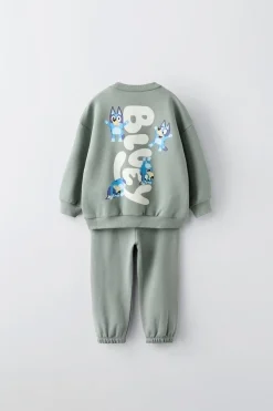 Niños ZARA 1½ - 6 Años·Sudaderas|1½ - 6 Años·Pantalones<CONJUNTO JOGGING SUDADERA Y PANTALÓN BLUEY © LUDO STUDIO