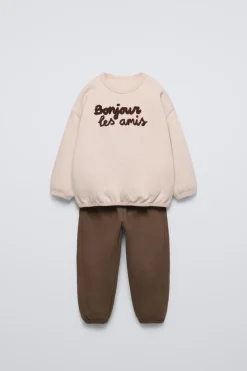 Niños ZARA 1½ - 6 Años·Sudaderas|1½ - 6 Años·Pantalones<CONJUNTO JOGGING SUDADERA Y JOGGER TEXTO RIZO