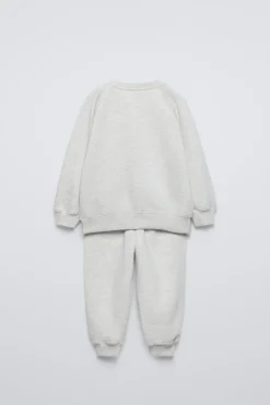 Niños ZARA 1½ - 6 Años·Sudaderas|1½ - 6 Años·Pantalones<CONJUNTO JOGGING SUDADERA Y PANTALÓN TEXTO FLOCK