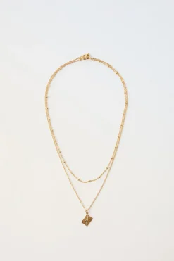 Niños ZARA 1½ - 6 Años·Accesorios|Accesorios / Zapatos / 0 - 14 Años<PACK DOS COLLARES BOLITAS Y CHARM SOBRE BAÑO ORO 24KT