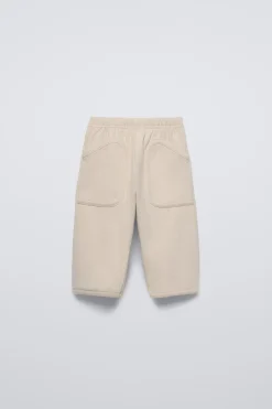 Niños ZARA 6 - 18 Meses·Pantalones / Leggings<PANTALÓN LISO BOLSILLOS
