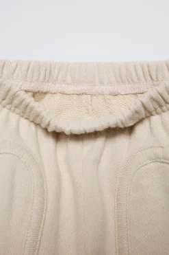 Niños ZARA 6 - 18 Meses·Pantalones / Leggings<PANTALÓN LISO BOLSILLOS
