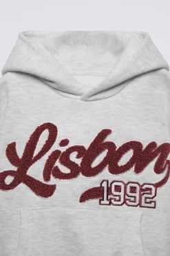 Niños ZARA 6 - 14 Años·Sudaderas<SUDADERA CAPUCHA TEXTO RIZO
