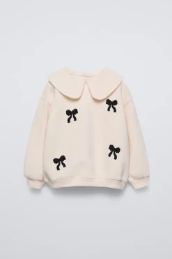 Niños ZARA 1½ - 6 Años·Sudaderas|6 - 18 Meses·Sudaderas<SUDADERA CUELLO APLIQUE LAZOS